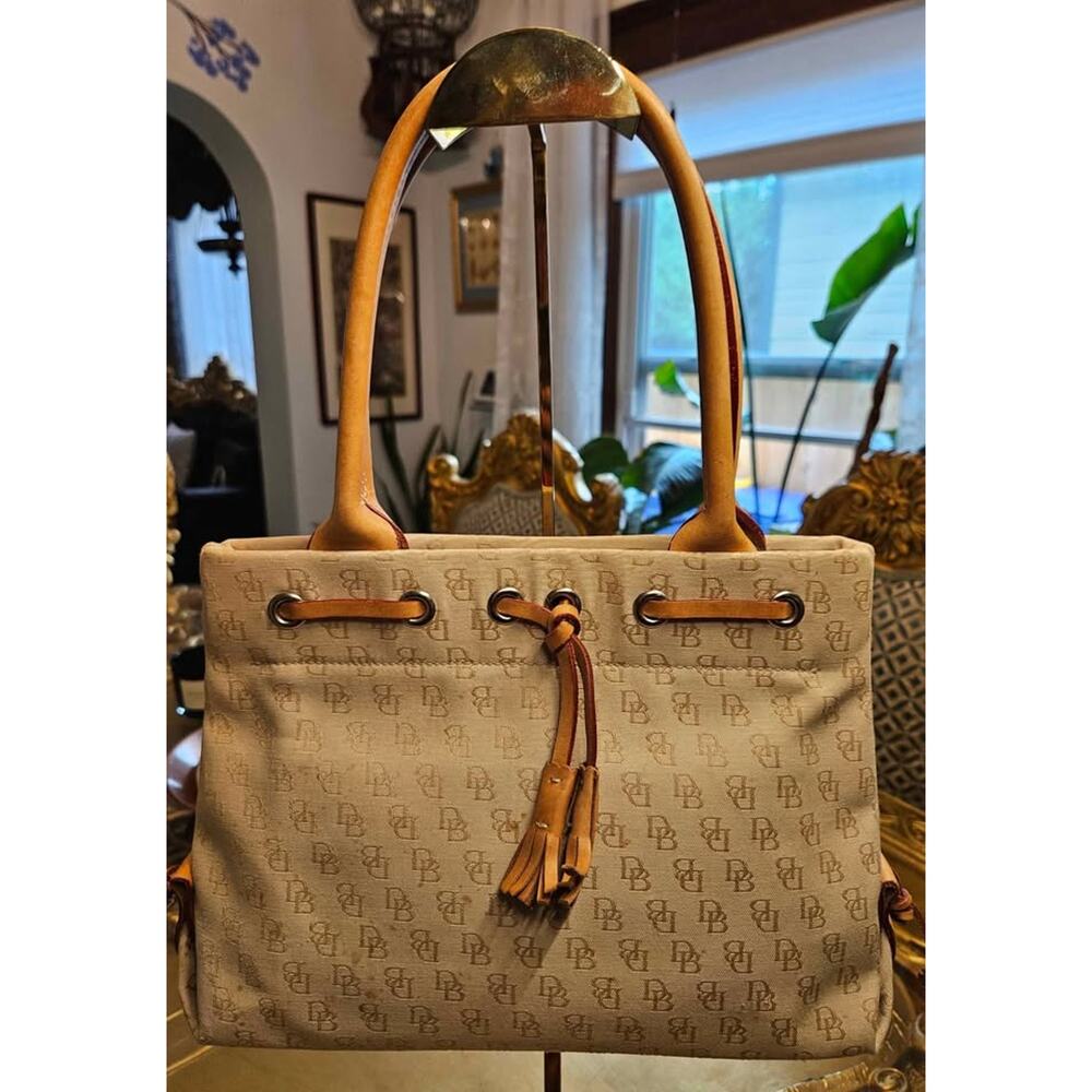 Dooney & Bourke Classic Logo Canvas Shoulder Bag – Tan with Camel Trim & Tassel